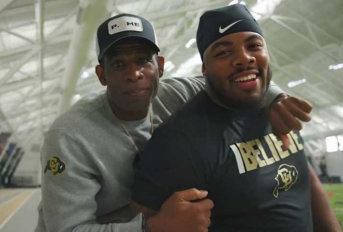 Deion Sanders with Chidozie Nwankwo at CU's practice field
